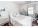 Light and airy bedroom with a queen-size bed and calming decor at 9772 Berrywood Dr, Ladson, SC 29456