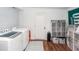 Convenient laundry room with washer, dryer, and ample storage space at 9772 Berrywood Dr, Ladson, SC 29456