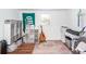 Multi-purpose room with built-in shelving, a comfortable rug, and natural light at 9772 Berrywood Dr, Ladson, SC 29456