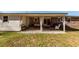 Covered patio with seating area, perfect for outdoor relaxation at 9772 Berrywood Dr, Ladson, SC 29456