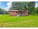 Brick ranch house with large backyard and mature trees at 1088 Quiet Rd, Mount Pleasant, SC 29464