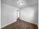 Simple bedroom with hardwood floors and an open doorway at 1104 Berkeley St, Hanahan, SC 29410