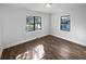 Well-lit bedroom with hardwood floors and neutral walls at 1104 Berkeley St, Hanahan, SC 29410