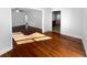 Sunlit living room with hardwood floors, offering open floor plan at 1104 Berkeley St, Hanahan, SC 29410