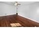 Spacious living room featuring hardwood floors and ceiling fan at 1104 Berkeley St, Hanahan, SC 29410