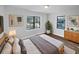 Main bedroom with dark hardwood floors, neutral walls, and ample light at 1104 Berkeley St, Hanahan, SC 29410