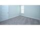 Empty bedroom with grey carpet and window at 115 Crosscut Ln, Summerville, SC 29486