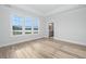 Bright bedroom with hardwood floors and large windows at 115 Crosscut Ln, Summerville, SC 29486