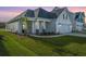 Two-story Craftsman home with a covered porch and attached two-car garage at 115 Crosscut Ln, Summerville, SC 29486