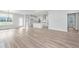 Open concept kitchen with white cabinetry, island, and stainless steel appliances at 115 Crosscut Ln, Summerville, SC 29486