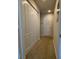 Hallway with carpet and double door closet at 1300 Park West Blvd # 110, Mount Pleasant, SC 29466