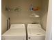 Small laundry closet with washer and dryer at 1300 Park West Blvd # 110, Mount Pleasant, SC 29466