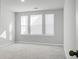 Bright bedroom with three windows and neutral decor at 149 Cypress Preserve Blvd, Moncks Corner, SC 29461