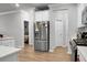 Modern kitchen with stainless steel refrigerator and gas range at 149 Cypress Preserve Blvd, Moncks Corner, SC 29461