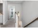 Upstairs hallway with access to laundry and bathroom at 149 Cypress Preserve Blvd, Moncks Corner, SC 29461