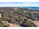 Aerial view showcasing community, golf course, and ocean access at 149 High Hammock Villas, Seabrook Island, SC 29455
