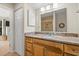 Bathroom featuring granite countertops and wood cabinets at 149 High Hammock Villas, Seabrook Island, SC 29455