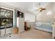 Spacious bedroom with large window, dresser, and sitting area at 149 High Hammock Villas, Seabrook Island, SC 29455