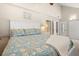 King-size bed, white headboard, and coastal decor in Primary bedroom at 149 High Hammock Villas, Seabrook Island, SC 29455