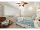 Charming bedroom with a queen-size bed and a ceiling fan at 149 High Hammock Villas, Seabrook Island, SC 29455