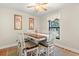 Bright dining room with a table for six, and a view of the backyard at 149 High Hammock Villas, Seabrook Island, SC 29455