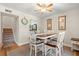 Charming dining area with a table for six and hardwood floors at 149 High Hammock Villas, Seabrook Island, SC 29455