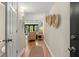 Bright entryway with hardwood floors and view to living room at 149 High Hammock Villas, Seabrook Island, SC 29455