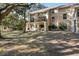 Back exterior view with patio and landscaping at 149 High Hammock Villas, Seabrook Island, SC 29455