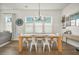 Bright dining room with wood table and chandelier at 212 Magnolia Garden Dr, Summerville, SC 29483
