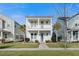 Two-story house with white siding, front porch, and landscaping at 212 Magnolia Garden Dr, Summerville, SC 29483