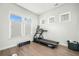 Home gym with treadmill and plenty of space for workouts at 212 Magnolia Garden Dr, Summerville, SC 29483