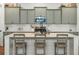 Modern kitchen with stainless steel appliances and light green cabinets at 212 Magnolia Garden Dr, Summerville, SC 29483