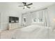 Main bedroom with king-size bed, dresser, and private balcony at 212 Magnolia Garden Dr, Summerville, SC 29483