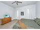 Bedroom with dresser, large bed, and window with curtains at 225 Witherspoon St, Summerville, SC 29486