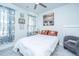 Cozy bedroom with full-size bed and window at 225 Witherspoon St, Summerville, SC 29486