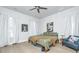 Main bedroom with large bed, window, and ceiling fan at 225 Witherspoon St, Summerville, SC 29486