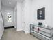 Bright entryway with hardwood floors and console table at 225 Witherspoon St, Summerville, SC 29486