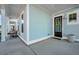 Front porch with black door and light blue siding at 225 Witherspoon St, Summerville, SC 29486