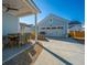 Two-car garage with patio and outdoor seating area at 225 Witherspoon St, Summerville, SC 29486