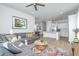 Open living room with kitchen views, sectional sofa, and area rug at 225 Witherspoon St, Summerville, SC 29486