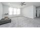 Spacious loft area with plush carpet and a ceiling fan at 225 Witherspoon St, Summerville, SC 29486