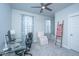Home office with glass desk and comfortable seating at 225 Witherspoon St, Summerville, SC 29486