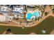Aerial view of community pool, clubhouse, and tennis courts at 234 Sea Lavender Ln, Summerville, SC 29486