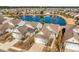 Aerial view of homes and pond with fountain at 234 Sea Lavender Ln, Summerville, SC 29486