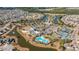 Aerial view of community with homes, lakes, and amenities at 234 Sea Lavender Ln, Summerville, SC 29486