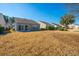 Spacious backyard with mature trees and grassy area at 234 Sea Lavender Ln, Summerville, SC 29486