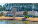 Backyard of home with pond and trees at 234 Sea Lavender Ln, Summerville, SC 29486