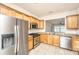 Kitchen with stainless steel appliances and light wood cabinets at 234 Sea Lavender Ln, Summerville, SC 29486