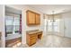 Kitchen features granite countertop desk and bay window at 234 Sea Lavender Ln, Summerville, SC 29486
