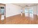 Spacious living room with hardwood floors and access to a sunroom and water view at 234 Sea Lavender Ln, Summerville, SC 29486
